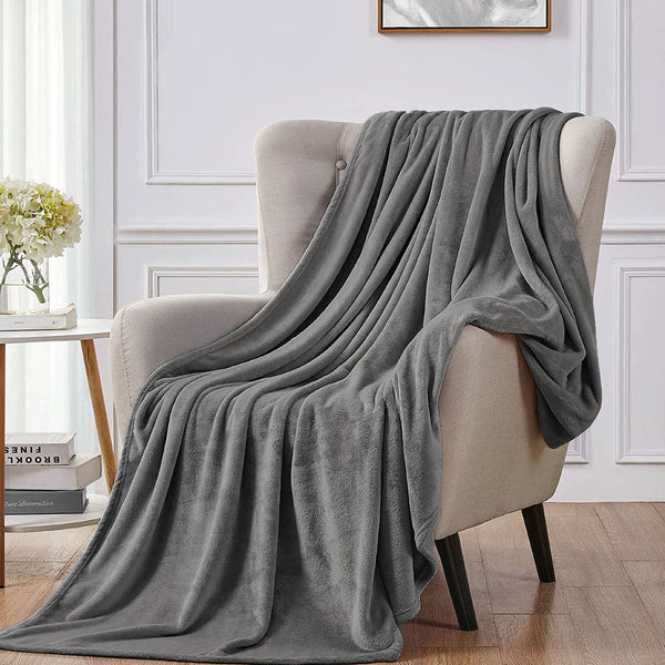 Fleece blanket, Fleece throw blanket, fluffy blanket, warm blanket, soft blanket "Soft dark grey fleece sofa throw blanket. Cozy and stylish. Perfect for snuggling. High-quality material. Available now at our e-commerce store." best soft fleece sofa throw blankets in Ireland, soft, cozy, snuggy, warm, romantic