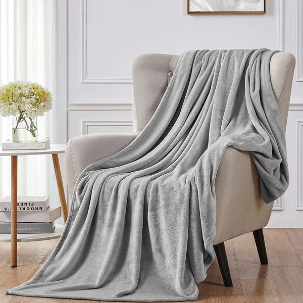 Fleece blanket, Fleece throw blanket, fluffy blanket, warm blanket, soft blanket "Soft light grey fleece sofa throw blanket. Cozy and stylish. Perfect for snuggling. High-quality material. Available now at our e-commerce store." best soft fleece sofa throw blankets in Ireland, soft, cozy, snuggy, warm, romantic